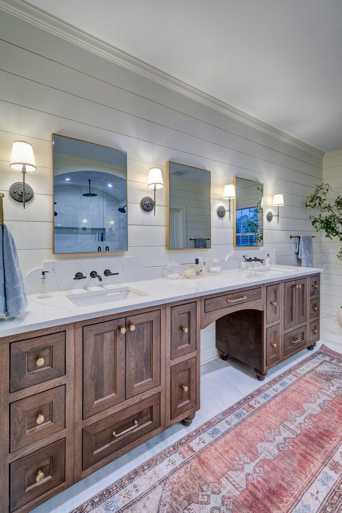 Master bathroom with dual vanity and wood cabinetry remodeled by Silver Oak in Roswell, GA