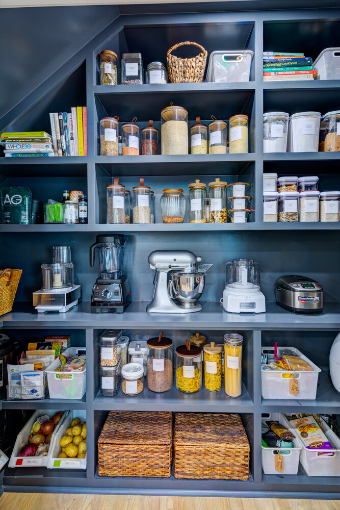 Built-in pantry organization with appliances and labeled storage by Silver Oak Remodel in Greater Atlanta kitchen remodel