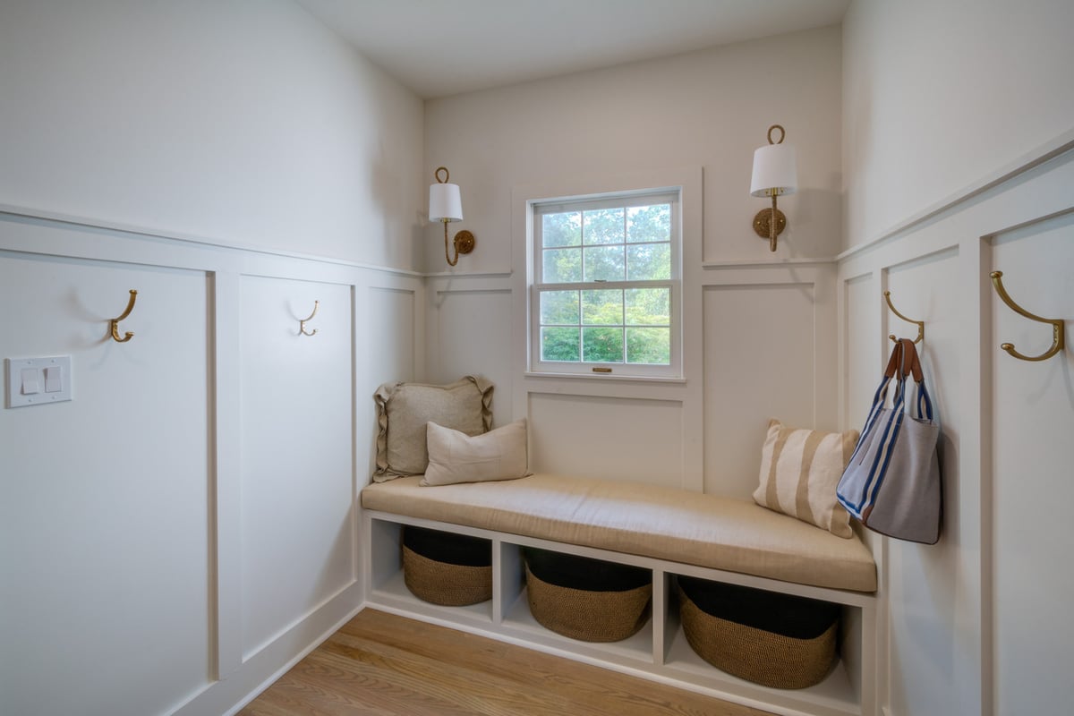 Cozy mudroom nook with bench seating and built-in storage by Silver Oak Remodel in Greater Atlanta remodel