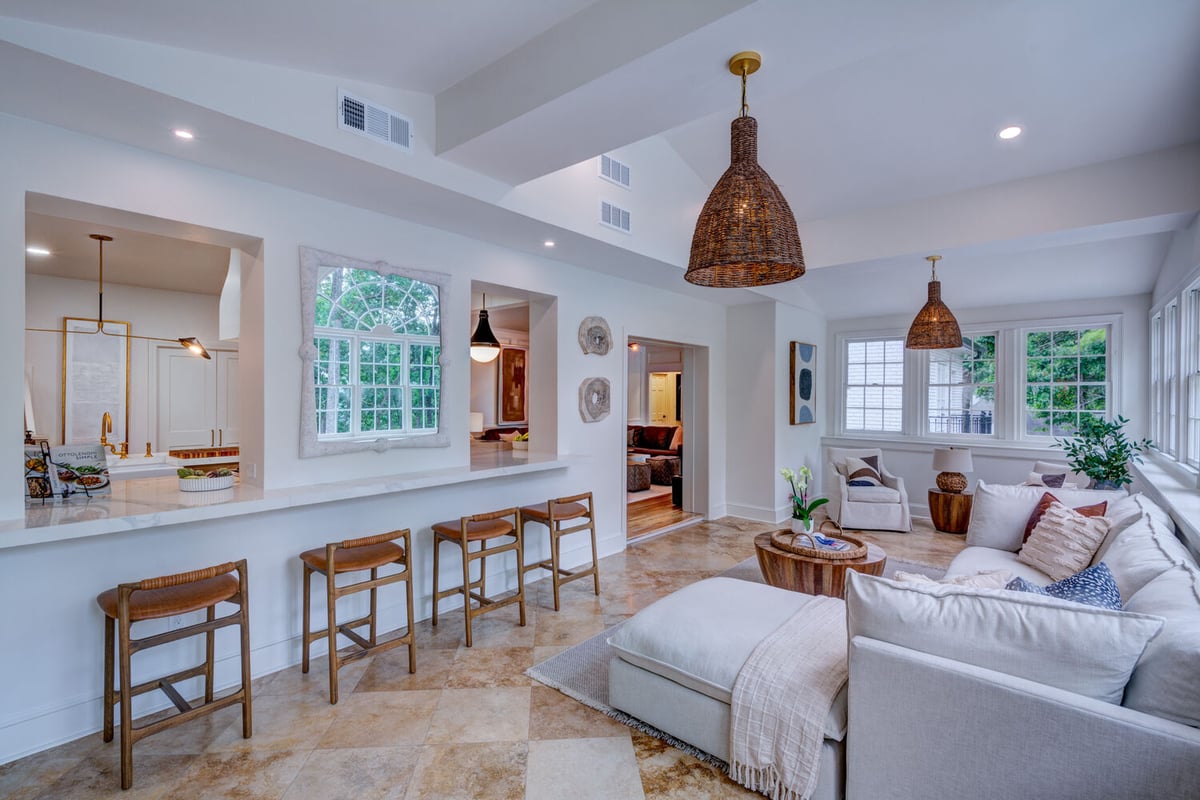 Sunroom bar seating and open kitchen view in Greater Atlanta remodel by Silver Oak Remodel