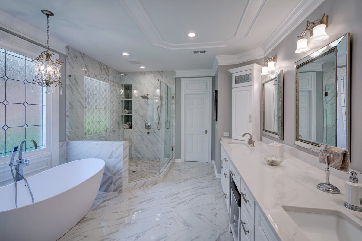 Luxurious master bathroom remodel in Sandy Springs, GA with freestanding tub and walk-in shower by Silver Oak Remodel